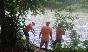 Recuperan cad&aacute;ver arrastrado por las aguas del r&iacute;o Yaque del Norte en Santiago
