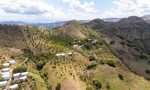 La Cueva, la comunidad de la cordillera Central que colecta fondos para instalar electricidad