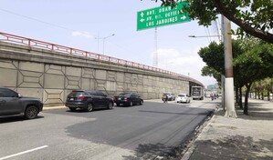 MOPC asfalta tramo deteriorado en la John F. Kennedy sin corregir filtraci&oacute;n que origin&oacute; el problema