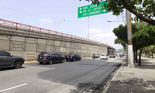 MOPC asfalta tramo deteriorado en la John F. Kennedy sin corregir filtraci&oacute;n que origin&oacute; el problema