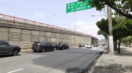 MOPC asfalta tramo deteriorado en la John F. Kennedy sin corregir filtraci&oacute;n que origin&oacute; el problema