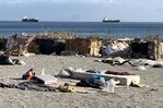 Casi 1,700 migrantes dejan playa de Ceuta escoltados por Policía y van a zonas habilitadas