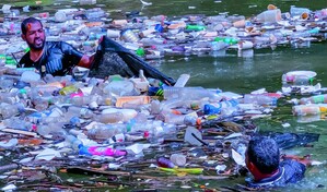Colocan barreras para atrapar desechos en el r&iacute;o Yaque del Norte