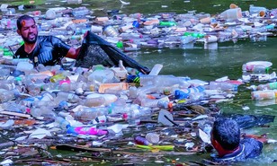 Colocan barreras para atrapar desechos en el r&iacute;o Yaque del Norte