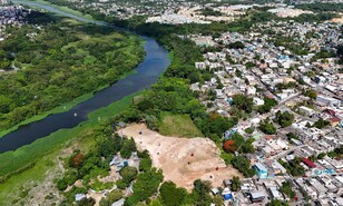 Contin&uacute;an relleno en &aacute;rea del r&iacute;o Ozama en Sabana Perdida