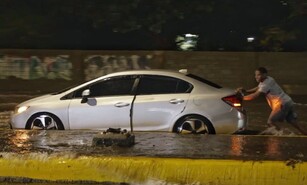 Lluvias generan inundaciones en calles y avenidas en el Distrito Nacional