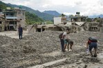 Nepal y China elevan a 1,225 los muertos al cumplirse una semana de operaciones tras riada