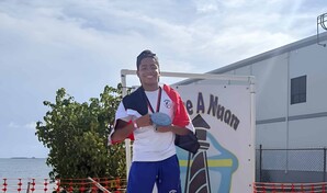 Miguel Eduardo Duverg&eacute; logra medalla de plata en el Cruce a Nado Internacional de la Bah&iacute;a de Ponce