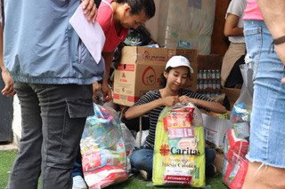 Parte del equipo de Cáritas Dominicana que trabajó recibiendo y ordenando las donaciones para ayudar a los afectados del terremoto en Venezuela