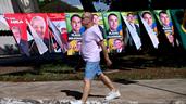 Lula y Fl&aacute;vio Bolsonaro juegan al vale todo en inciertas elecciones en Brasil