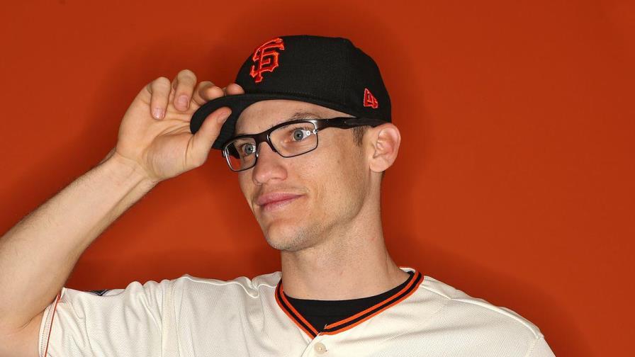 Los Rockies liberan a Kelby Tomlinson Los Rockies liberan a Kelby Tomlinson