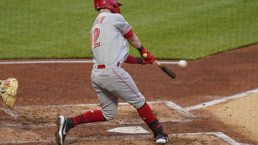 Naquin y Barnhardt comandan paliza de Rojos a Piratas