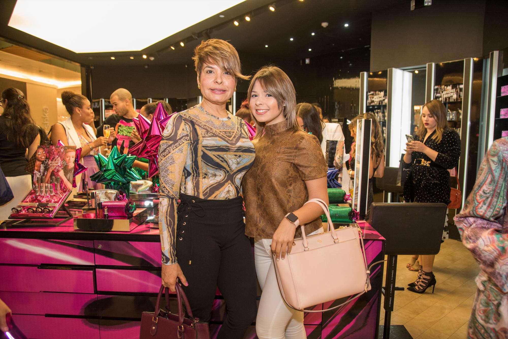 Sandra Reyes y Sandra Concepción.