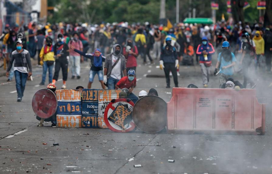 Al menos 22 detenidos y 21 policías heridos en protestas en Colombia