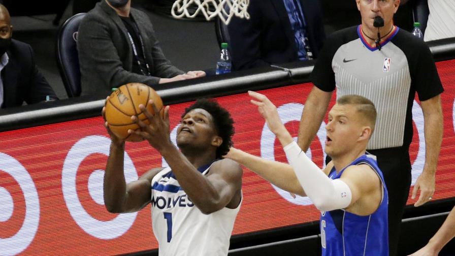 Edwards y los Timberwolves derrotan 136-121 a los Mavericks; Towns encesta 23
