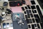 Autoridades allanan tiendas donde alteraban celulares presuntamente robados  Autoridades allanan tiendas donde alteraban celulares presuntamente robados