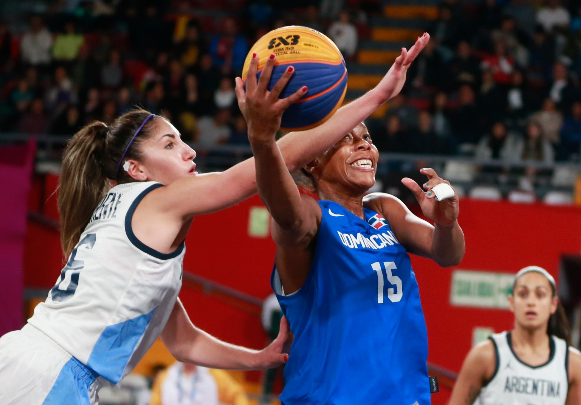 Victoria Llorente from Argentina competes against Sugeiry Monsac from Dominican Republic in the Basketball 3x3 game at Coliseo Eduardo Dibos during Pan American Games Lima 2019. 