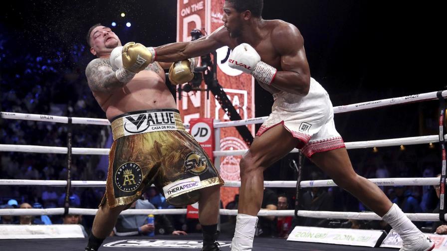 Joshua recupera sus títulos al vencer por decisión a Ruiz