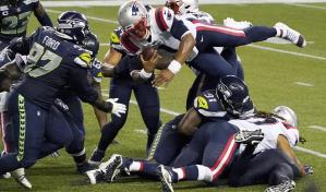 Seahawks frenan a Newton y derrotan a Patriots 35-30