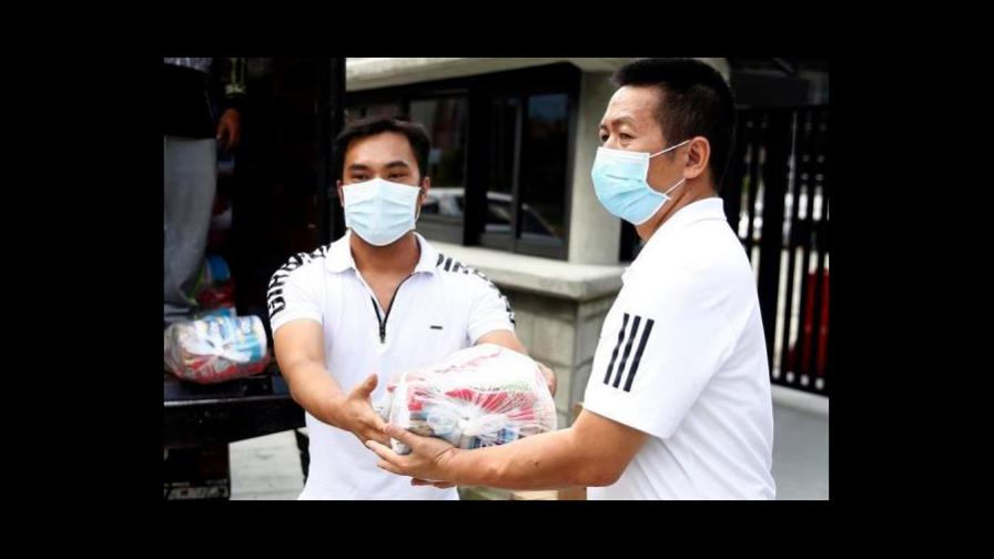 Chinos con restaurantes en Medellín donan alimentos en barriadas populares