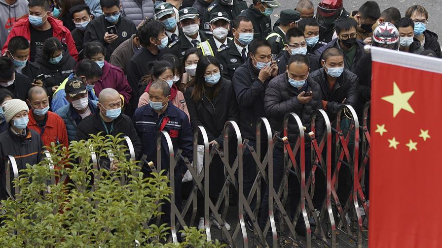 China aplica pruebas de COVID-19 a millones de personas