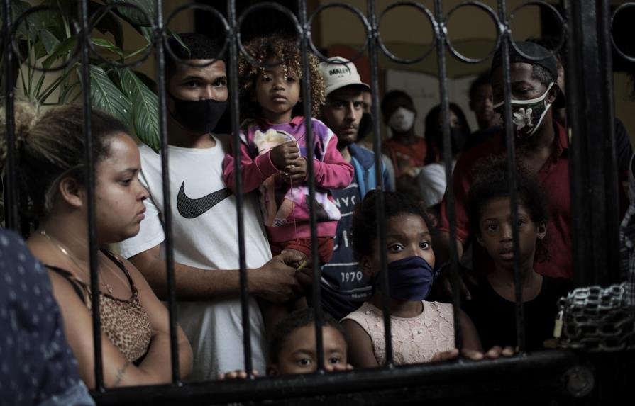 Reducción de ayudas por pandemia afecta a pobres en Brasil