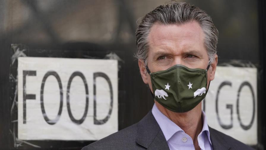 Los trabajadores seguirán usando mascarillas en California