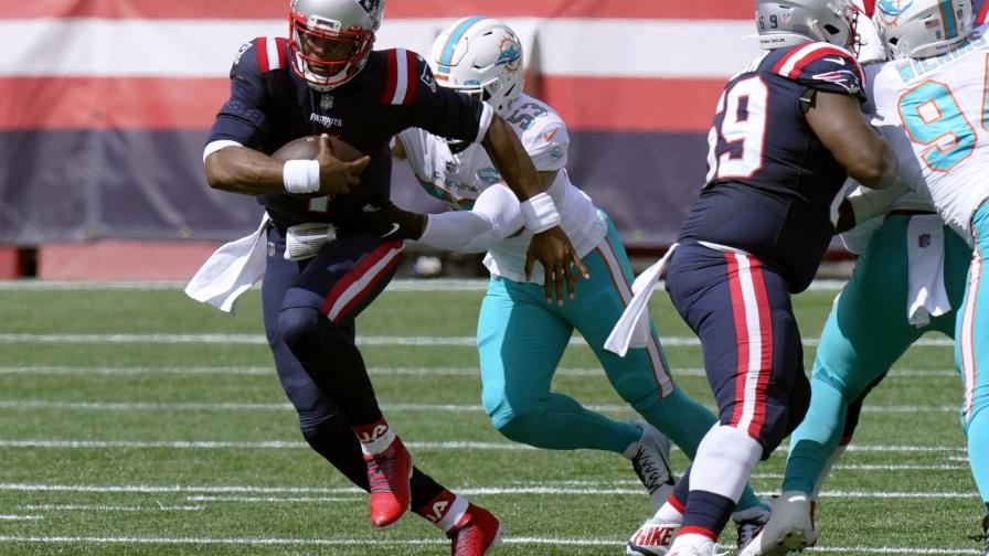 Newton anota 2 TD en acarreos, Patriots derrotan a Dolphins
