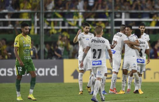 Boca empata en Caracas; Gremio vence a América de Cali Boca empata en Caracas; Gremio vence a América de Cali