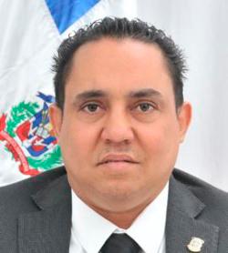 Orlando Antonio Martínez Peña, propietario del consorcio OM, diputado del PRM. 