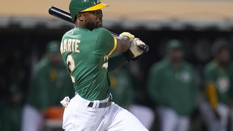 Harrison y Marte guían a Atléticos a triunfo ante Gigantes