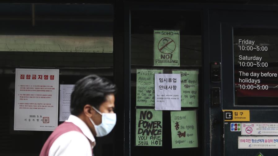 Suben infecciones en Asia; otros países alivian cuarentenas