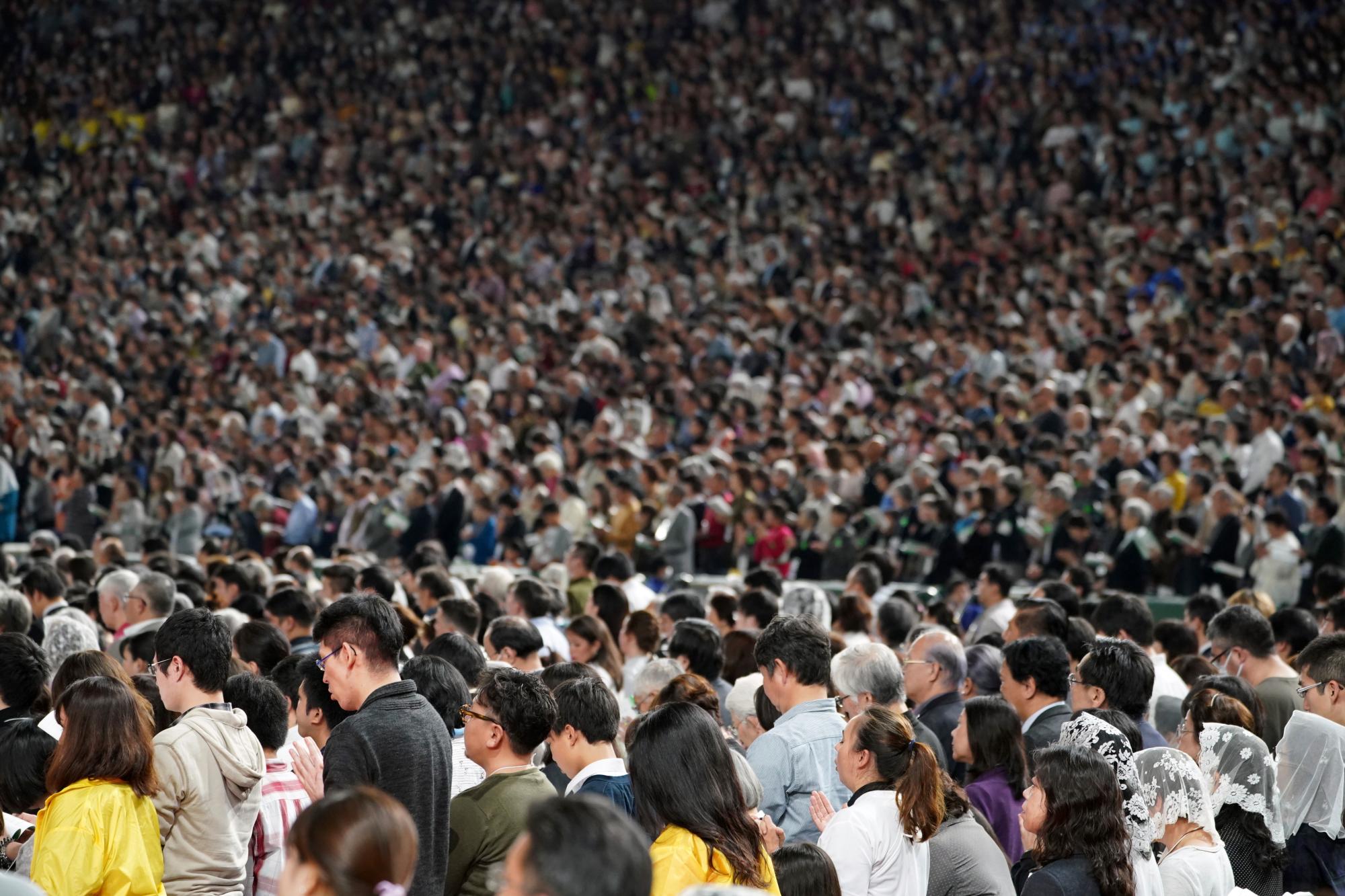 Thefaithful participate as Pope Francis celebrates Holy Mass at Tokyo Dome Monday, Nov. 25, 2019, in Tokyo. (AP Photo/Eugene Hoshiko)