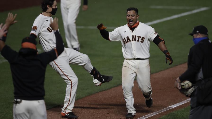 Gigantes vencen a Dodgers en 11mo gracias a jonrón de Solano Gigantes vencen a Dodgers en 11mo gracias a jonrón de Solano