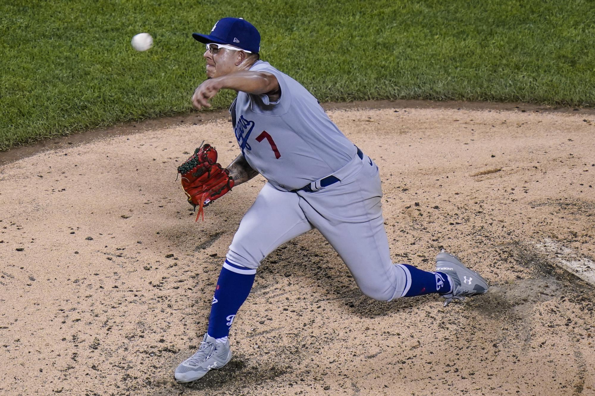 El zurdo de México, Julio Urias de los Dodgers de Los Ángeles, lidera en juegos ganados con marca de 13-3, hasta la jornada del 13 de agosto del 2021. (AP Photo/Frank Franklin II)