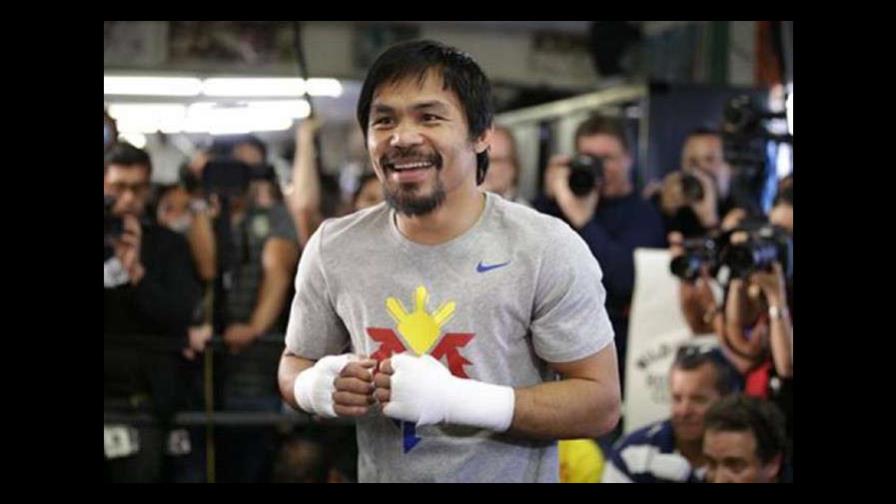 Manny Pacquiao intenta desanimar a su hijo en su intención de ser boxeador Manny Pacquiao intenta desanimar a su hijo en su intención de ser boxeador