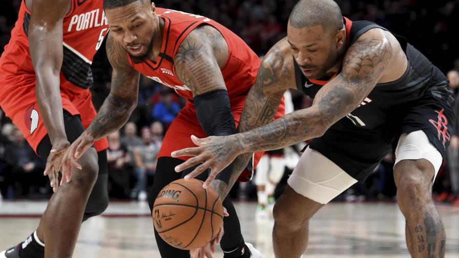 Blazers derrotan a Rockets con un triple doble de Lillard Blazers derrotan a Rockets con un triple doble de Lillard