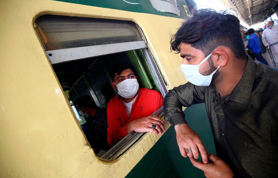 Podría haber nuevo brote internacional del virus en otoño, dice experto chino