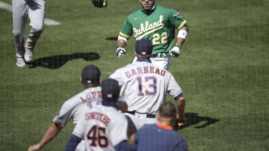 Pleito opaca triunfo de Oakland ante Astros; su 9no seguido Pleito opaca triunfo de Oakland ante Astros; su 9no seguido