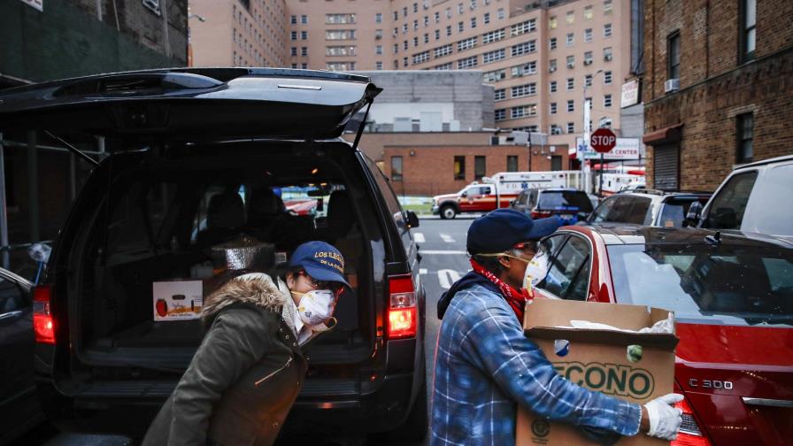 Inmigrantes en EEUU reparten comida y esperanza a trabajadores Inmigrantes en EEUU reparten comida y esperanza a trabajadores