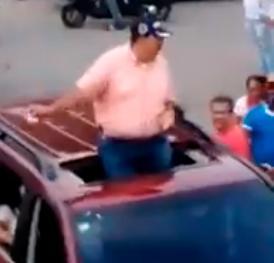 Video | Candidato a senador del PRM hace caravana y lanza dinero desde yipeta en Hato Mayor