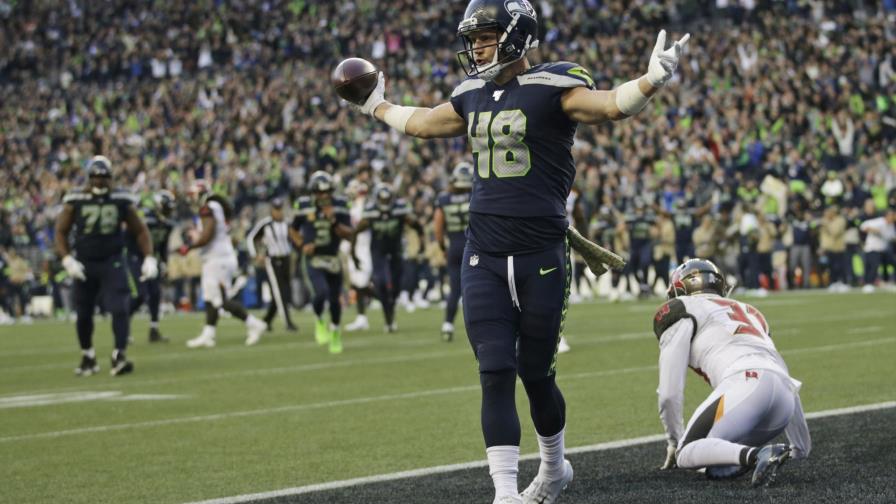 Wilson lanza para 5 anotaciones; Seahawks ganan en prórroga Wilson lanza para 5 anotaciones; Seahawks ganan en prórroga