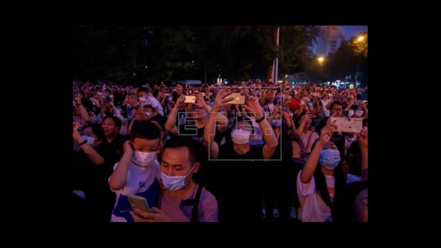 China detecta 98 nuevos casos de coronavirus, 55 de ellos por contagio local