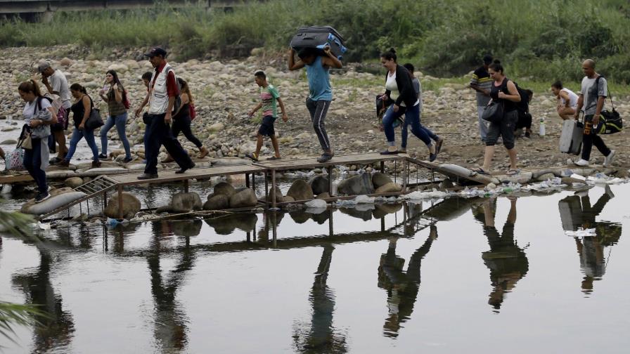 Colombia regularizará estatus de migrantes venezolanos