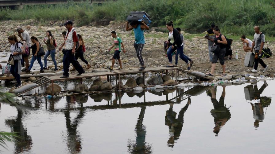 Colombia regularizará estatus de inmigrantes venezolanos