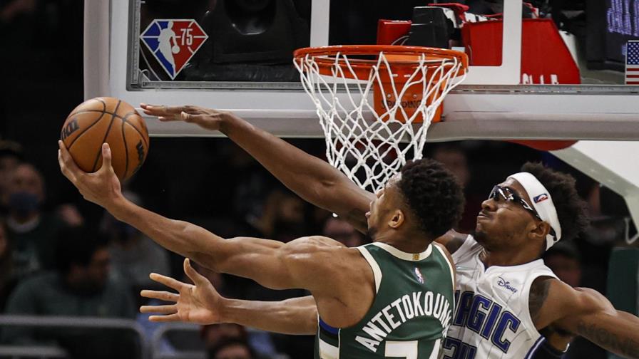Holiday anota 18 puntos y los Bucks aplastan 123-92 al Magic Holiday anota 18 puntos y los Bucks aplastan 123-92 al Magic