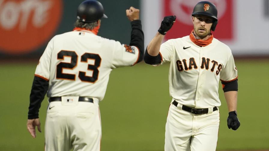 Gigantes ganan a Rockies, siguen optando a la postemporada