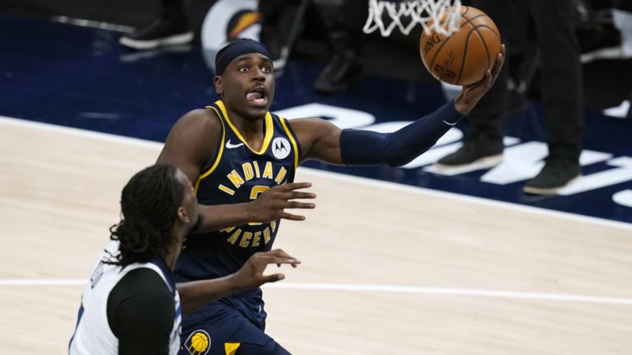 Hermanos Holiday llevan a Pacers hacia la victoria; Towns, 32 puntos en la derrota