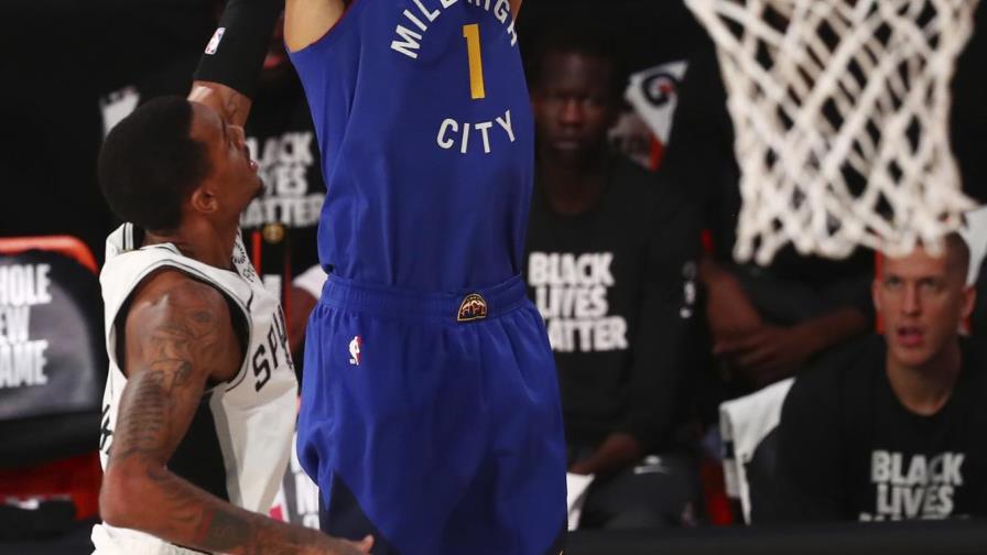 Porter anota 30 puntos y Nuggets supera a Spurs