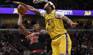 Robinson III anota 20 puntos y Warriors ganan 100-98 a Bulls